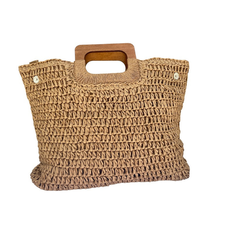 Hand-knitted beige straw bag with outlet wooden handle